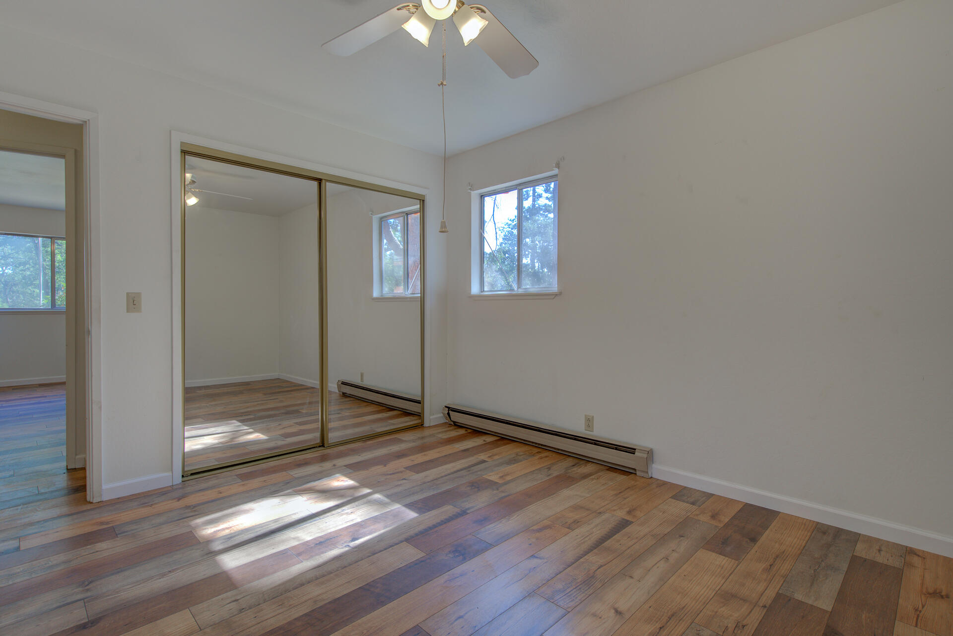 21694 Cassel Road Cassel, CA 96016 - Photo 33 of 65 wooden floor in an empty room with a window
