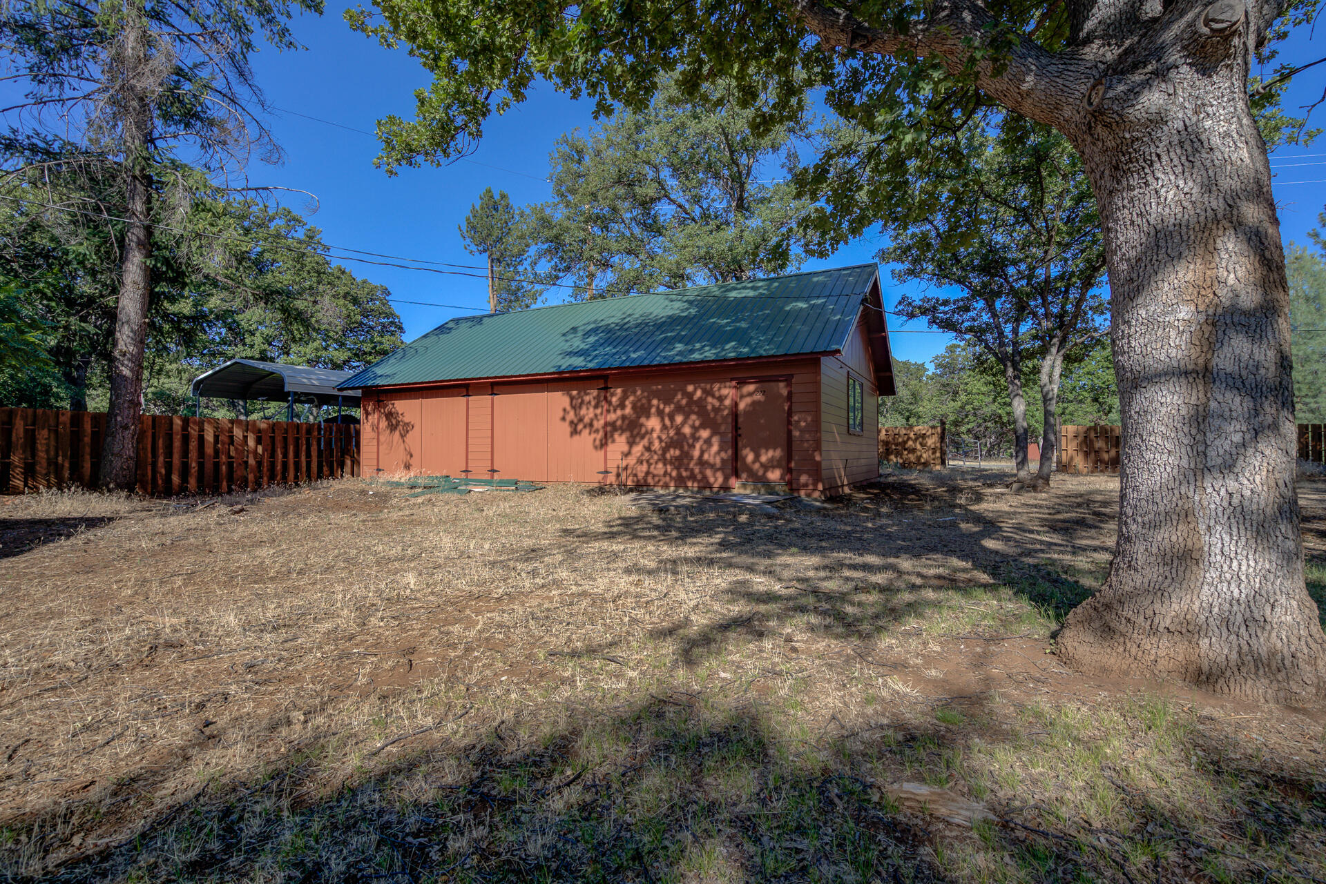 21694 Cassel Road Cassel, CA 96016 - Photo 53 of 65 a view of a house with a large tree and a yard