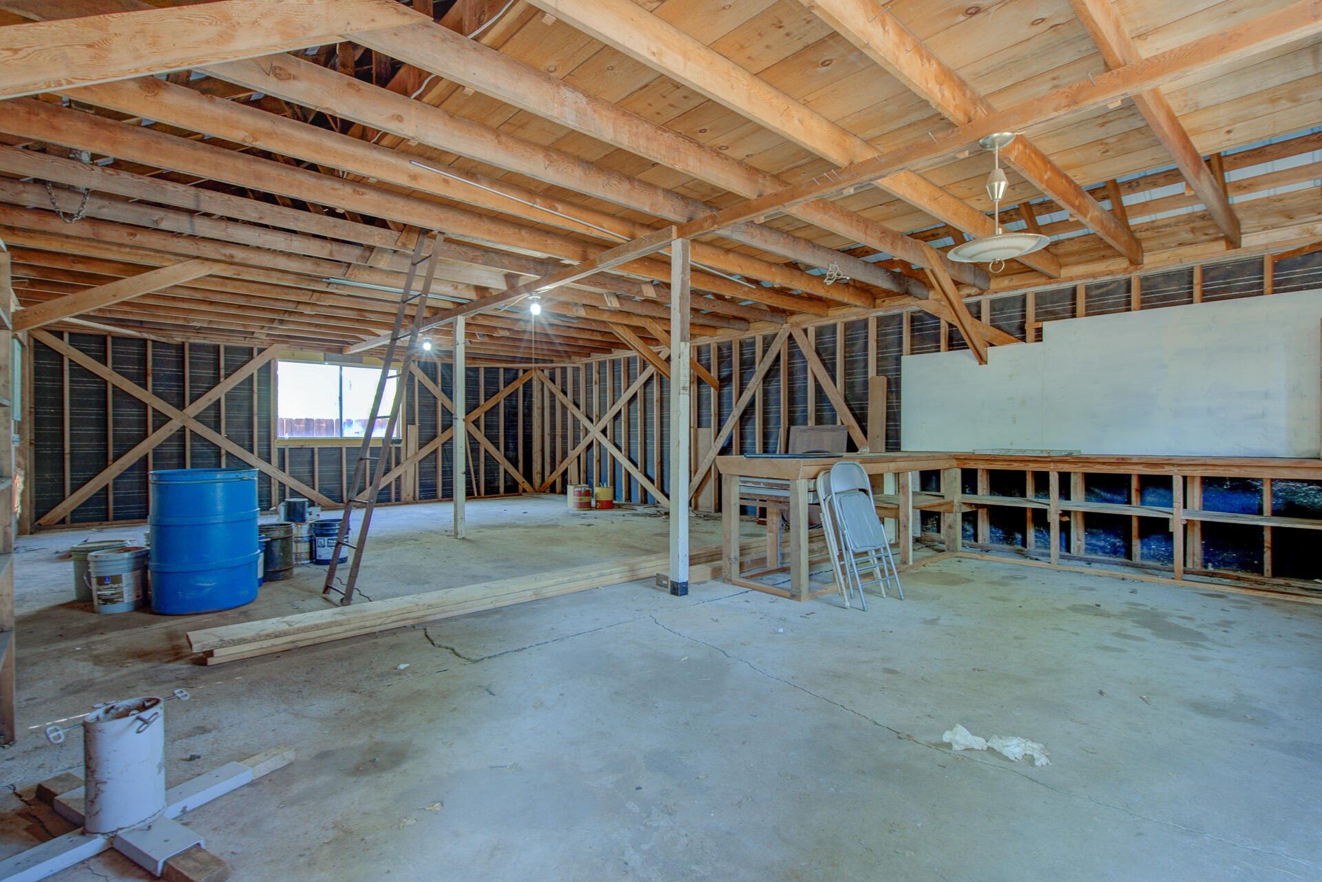 21694 Cassel Road Cassel, CA 96016 - Photo 54 of 65 a view of an empty room with wooden ceiling
