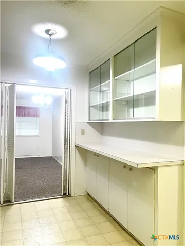 a view of a room with a window