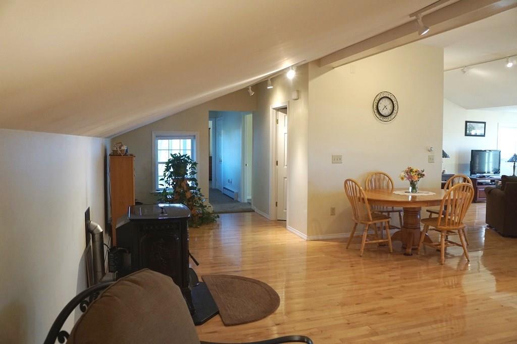 213 Shaker Hill Road Alfred, ME 04002 - Photo 14 of 35 Dining and sitting area and Pellet...