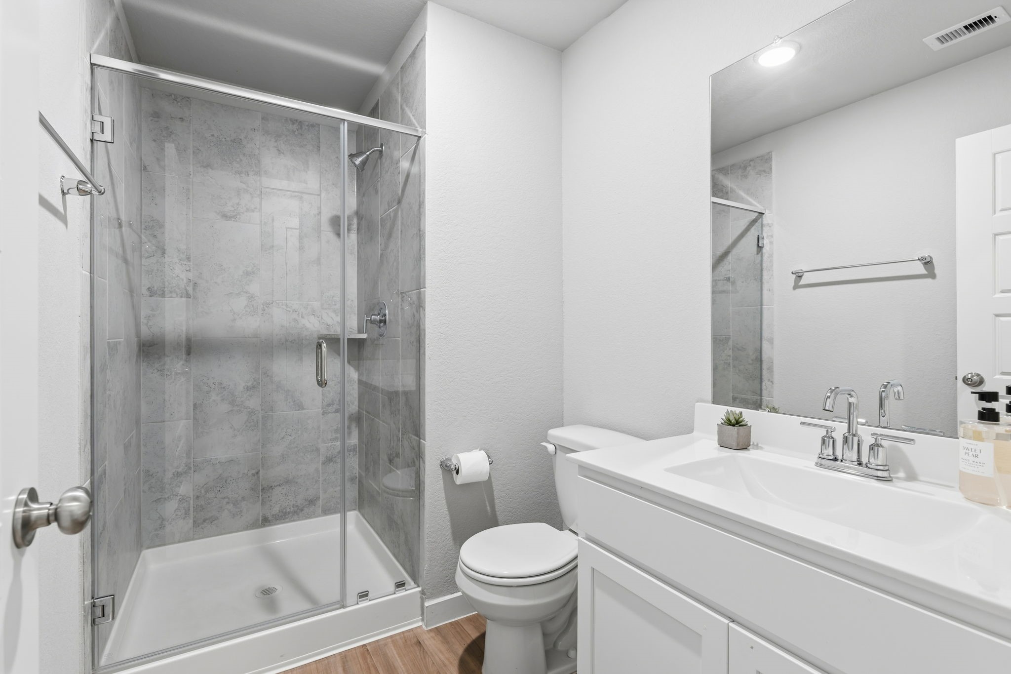 14914 Big Bend Ranch Drive Cypress, TX 77433 - Photo 36 of 49 a bathroom with a sink toilet and shower