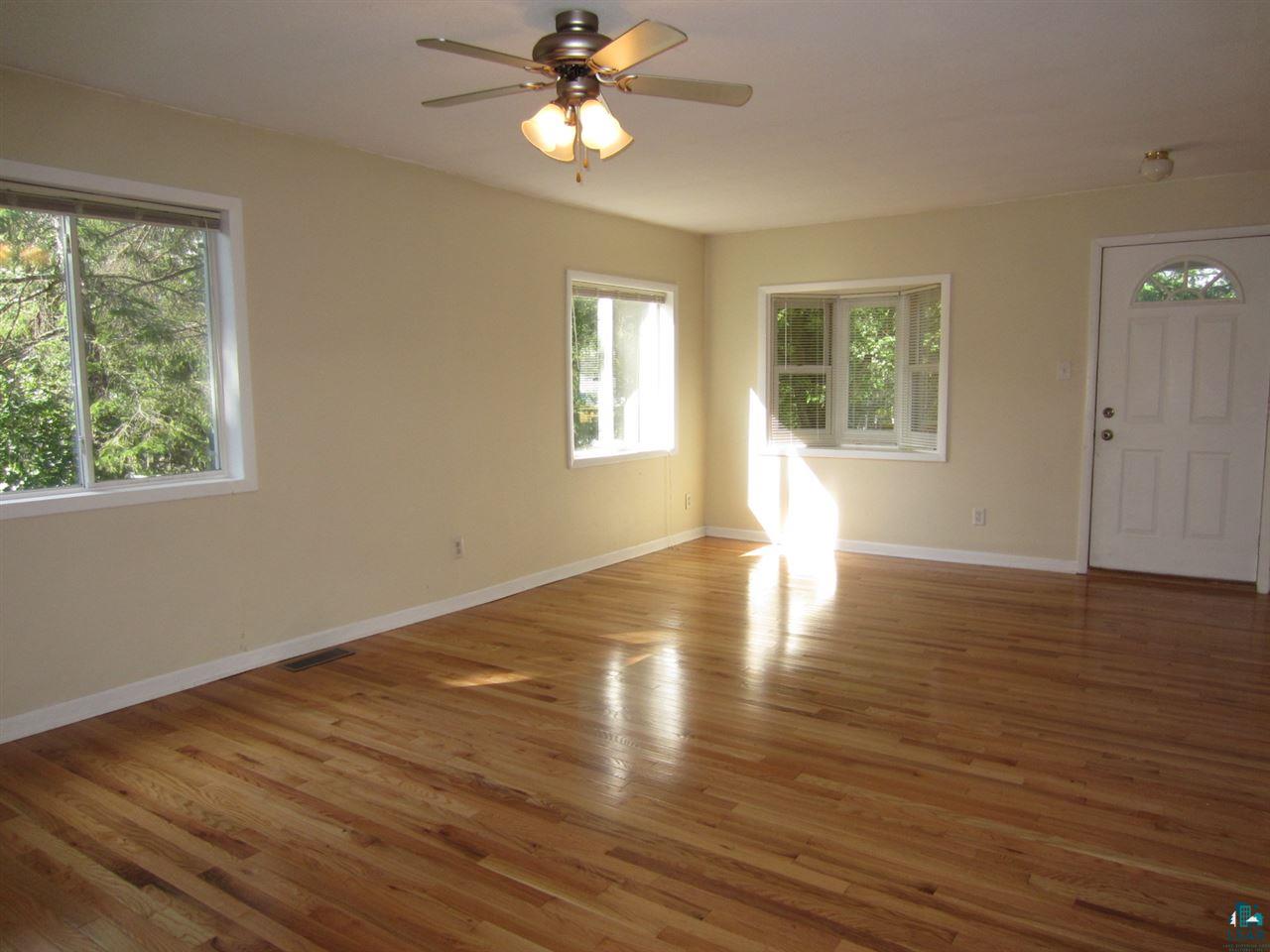 3766 Alexander Road Hermantown, MN 55811 - Photo 2 of 12 offers a bay window and gleaming hardwood floors.