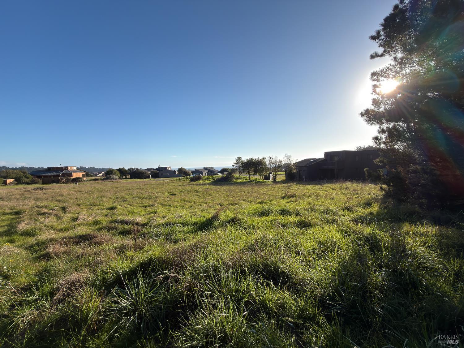 41 Sea Pine The Sea Ranch, CA 95497 - Photo 5 of 17 a view of a lake and sunset