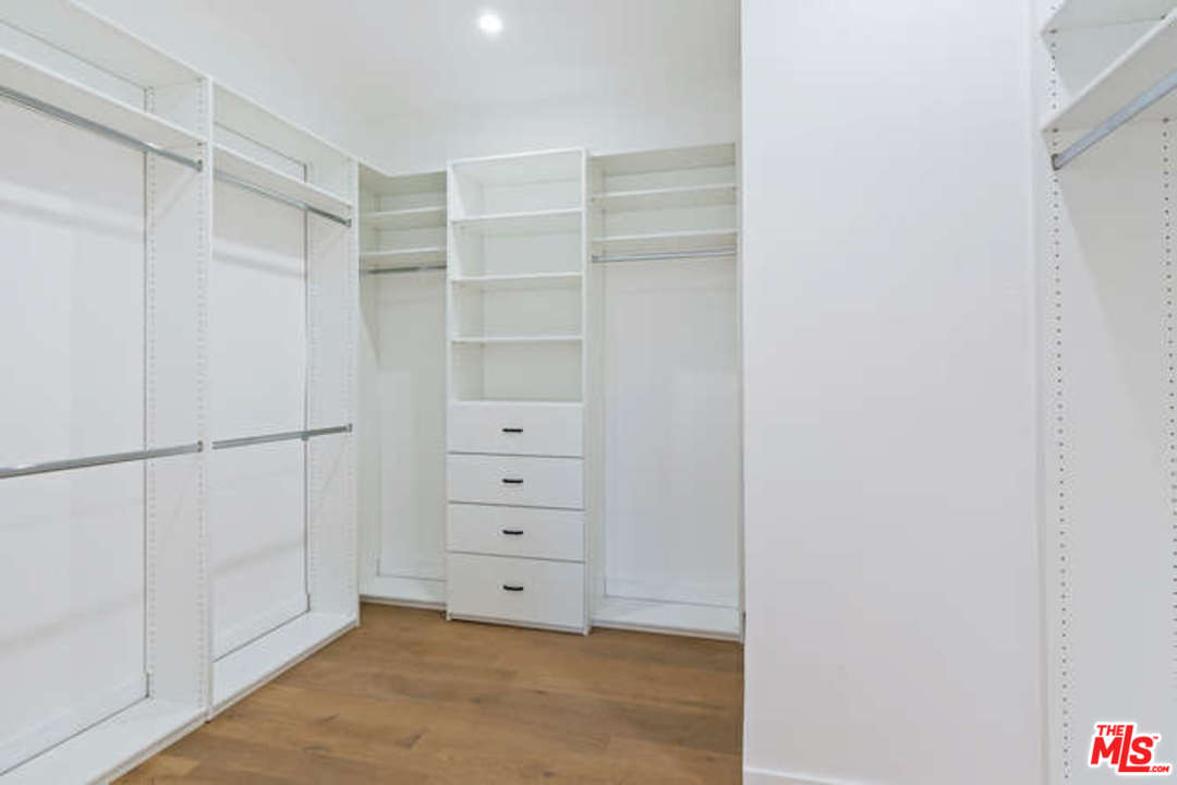 3628 Grayburn Road Pasadena, CA 91107 - Photo 16 of 25 a view of walk in closet with empty racks