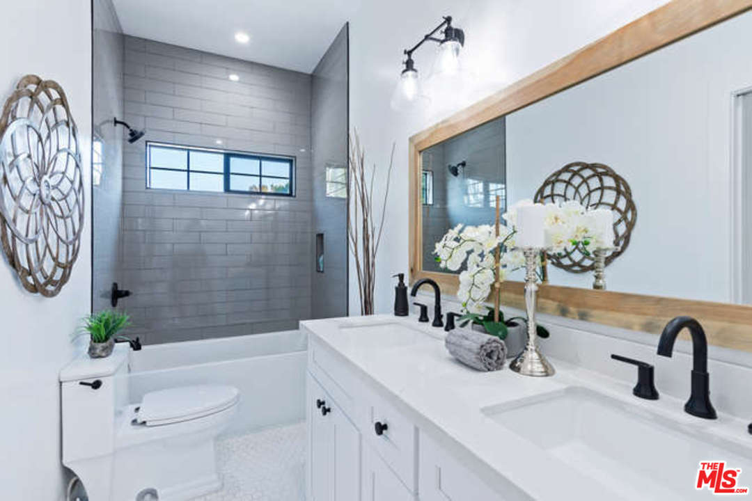 3628 Grayburn Road Pasadena, CA 91107 - Photo 20 of 25 a bathroom with a sink a toilet and shower