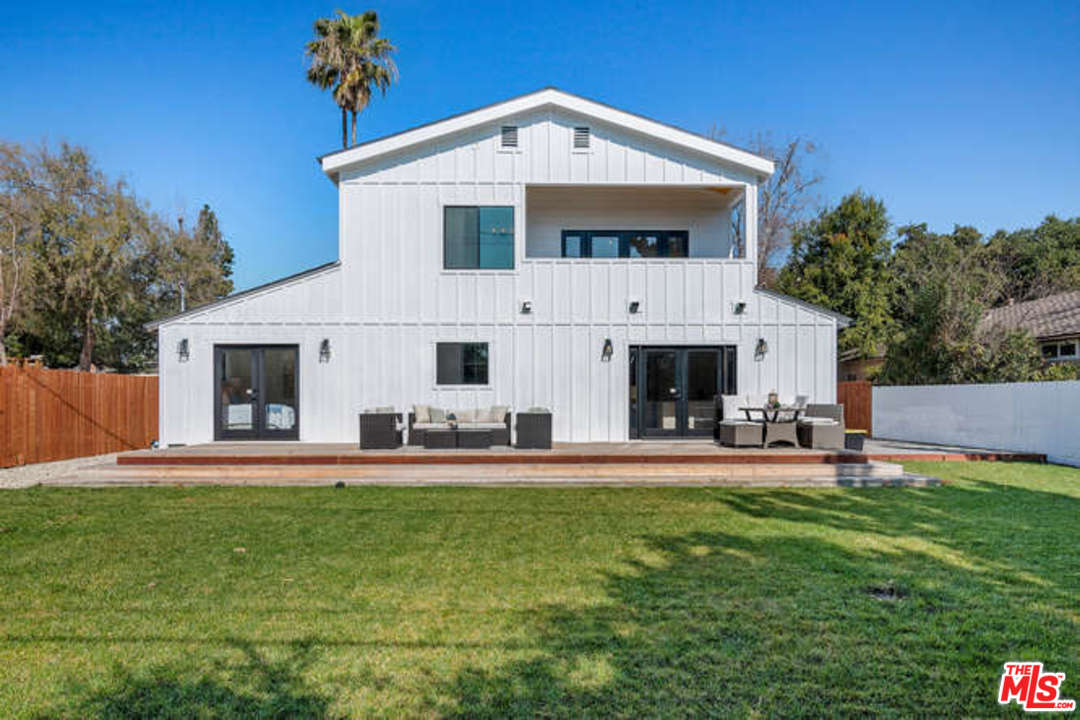 3628 Grayburn Road Pasadena, CA 91107 - Photo 24 of 25 a front view of a house with a yard and sitting area