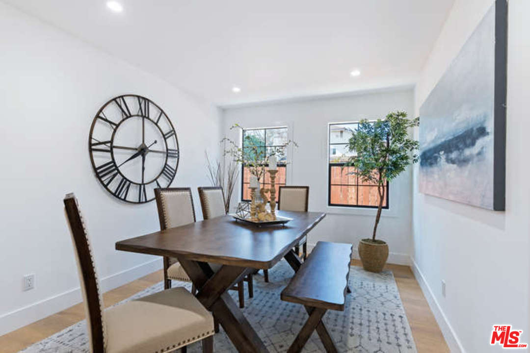 3628 Grayburn Road Pasadena, CA 91107 - Photo 9 of 25 a view of a dining room with furniture and wooden floor