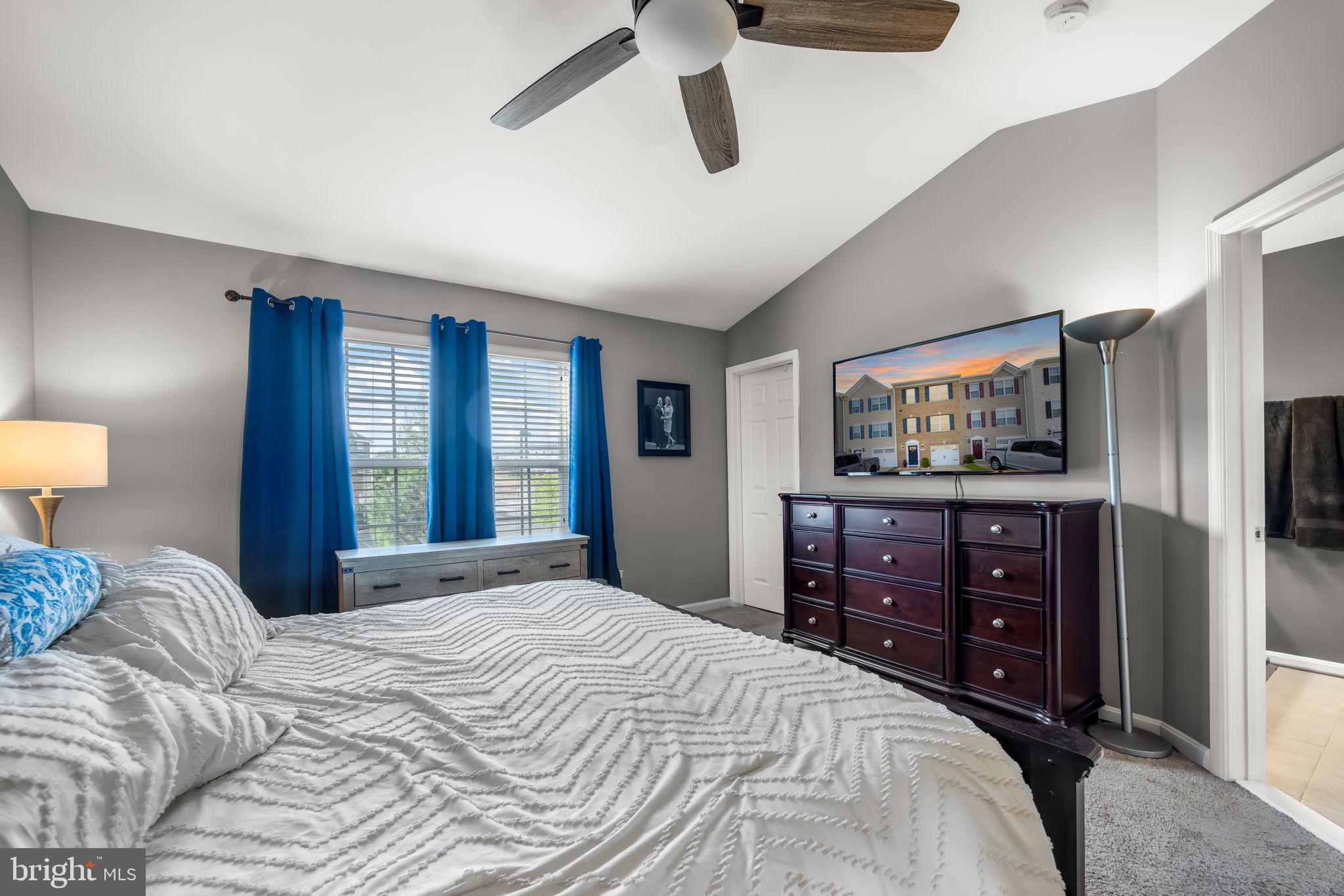 4719 Wensel Road Fredericksburg, VA 22408 - Photo 19 of 36 Serene bedroom with modern touches.