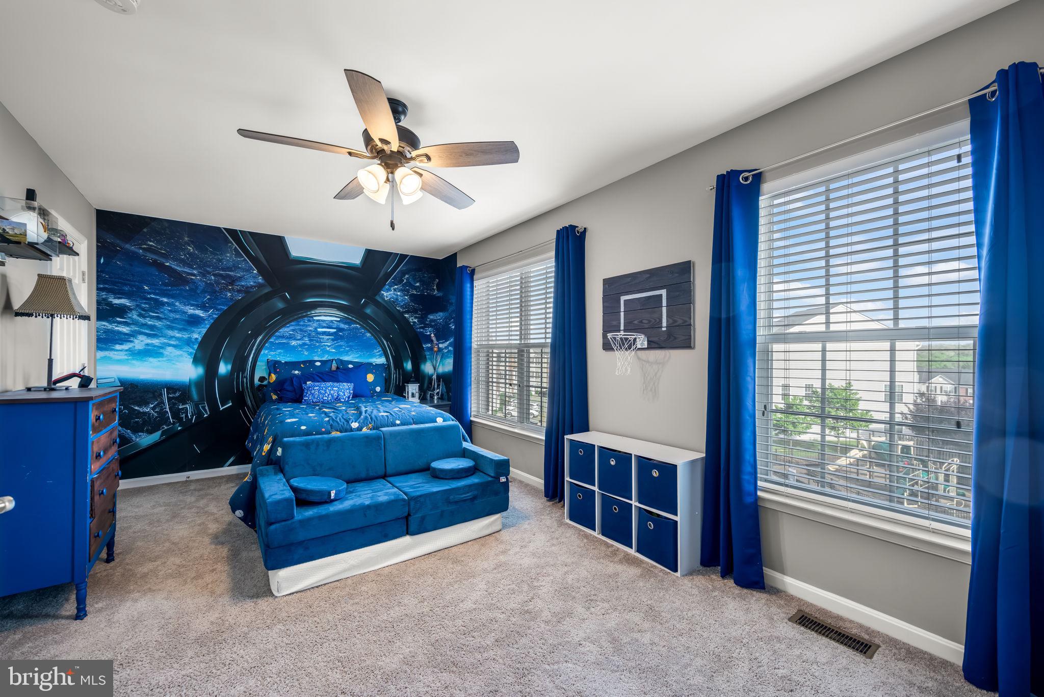 4719 Wensel Road Fredericksburg, VA 22408 - Photo 23 of 36 Cosmic-themed bedroom retreat.
