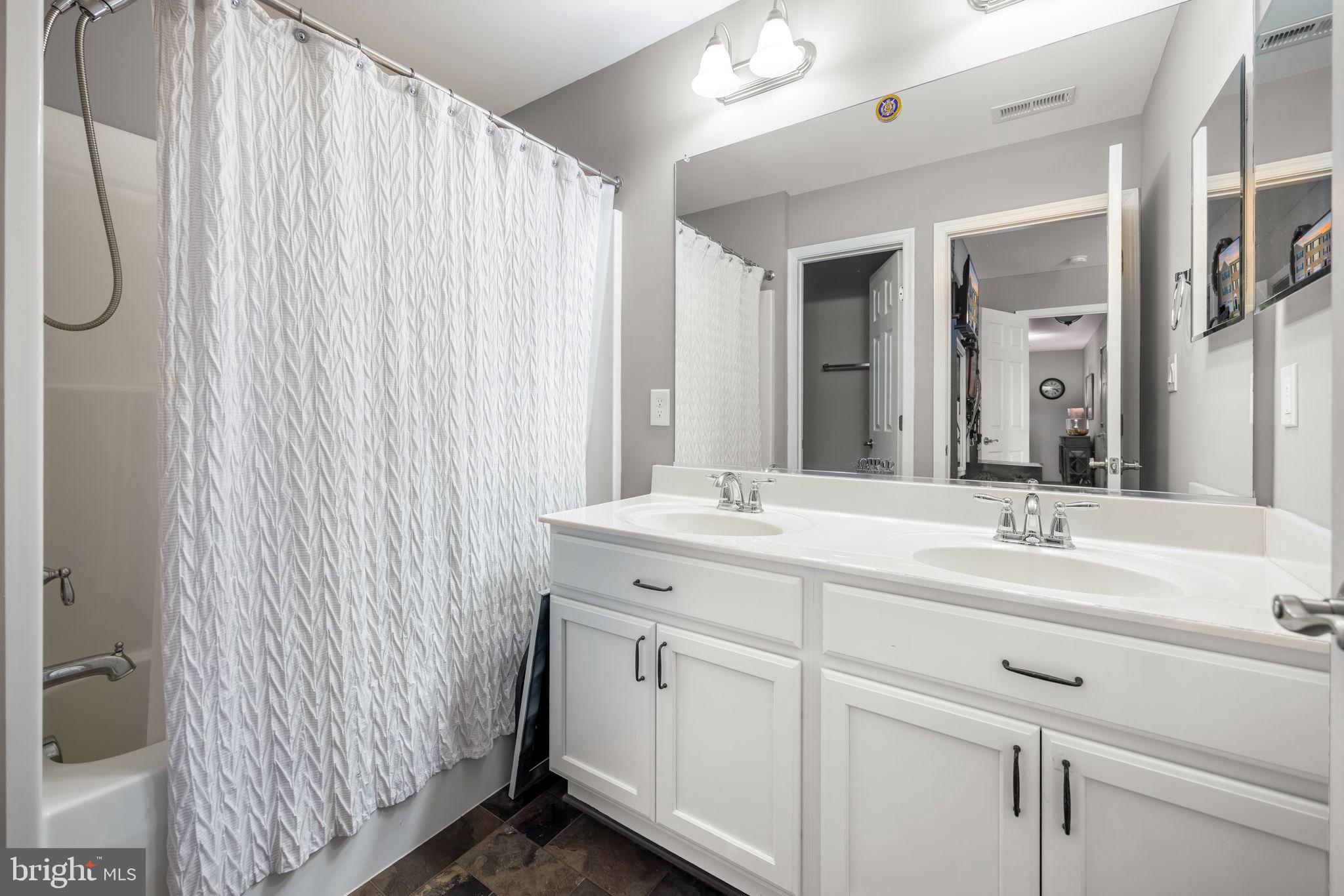 4719 Wensel Road Fredericksburg, VA 22408 - Photo 29 of 36 Modern bathroom with sleek finishes.