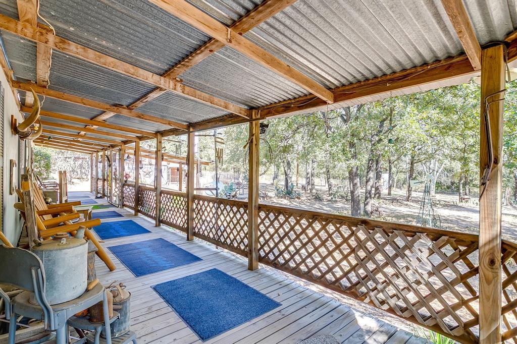 436 Luke Road Springtown, TX 76082 - Photo 10 of 39 View of wooden terrace