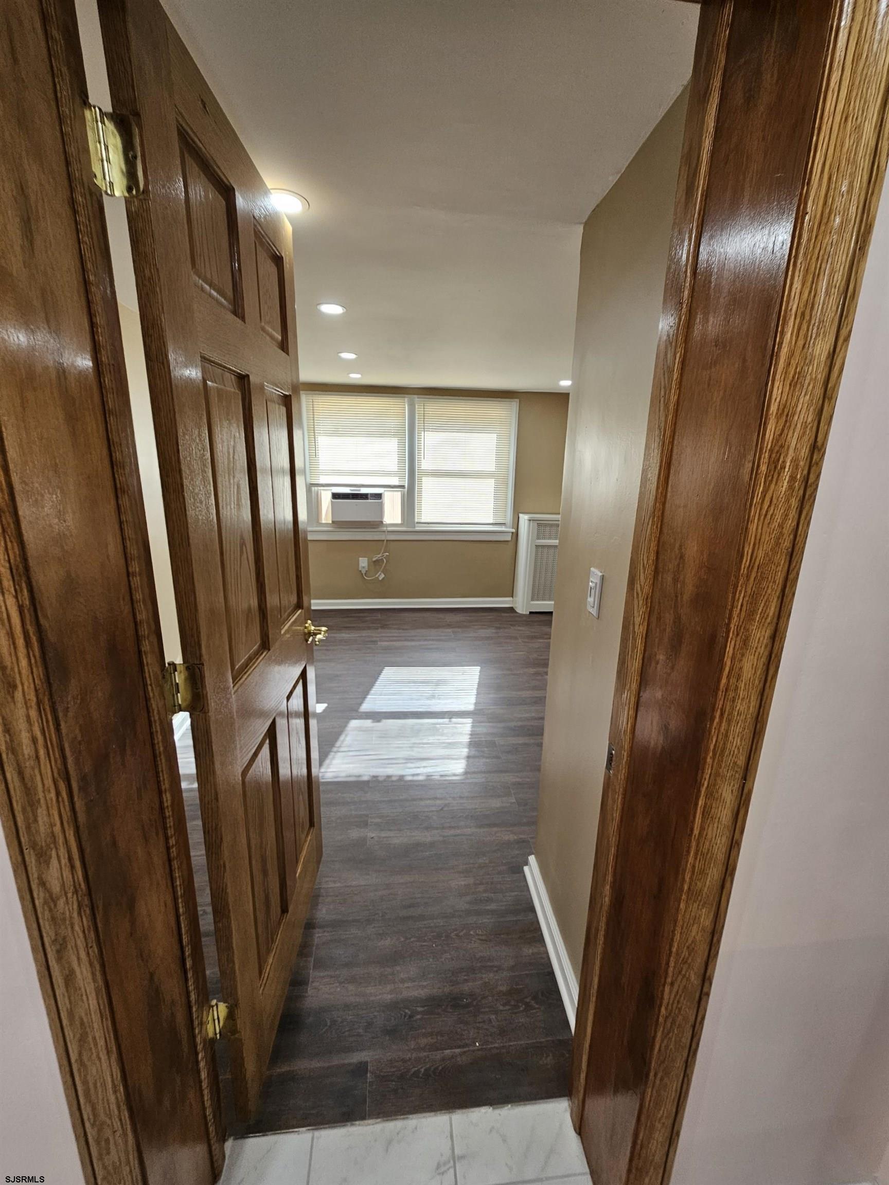 7 South Laclede Place, Unit 1 Atlantic City, NJ 08401 - Photo 11 of 21 a view of a hallway with wooden floor