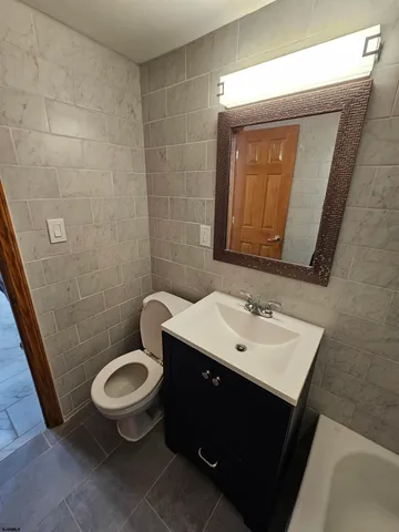 a bathroom with a sink and a tub