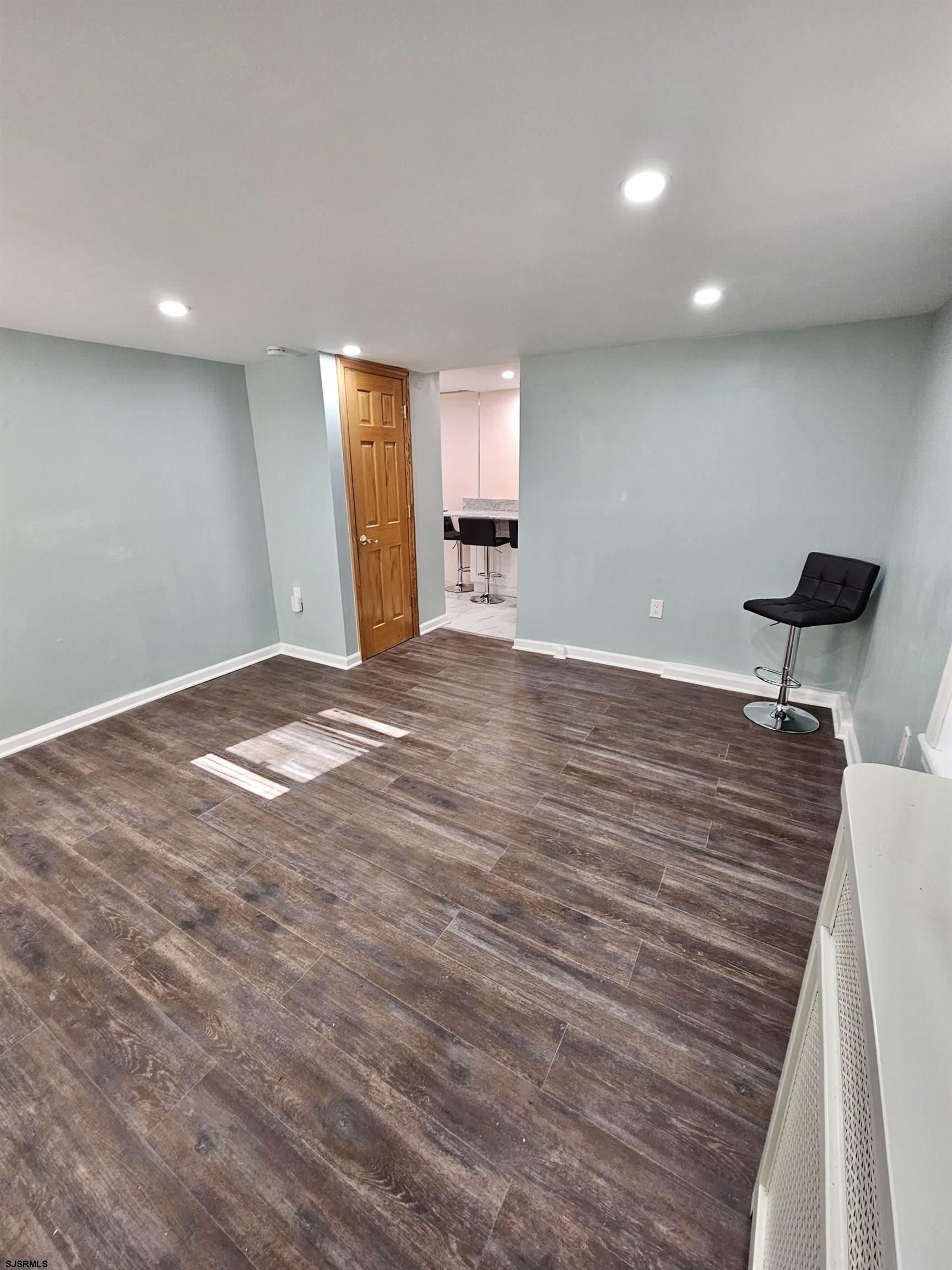 7 South Laclede Place, Unit 1 Atlantic City, NJ 08401 - Photo 2 of 21 a view of a livingroom with a flat screen tv