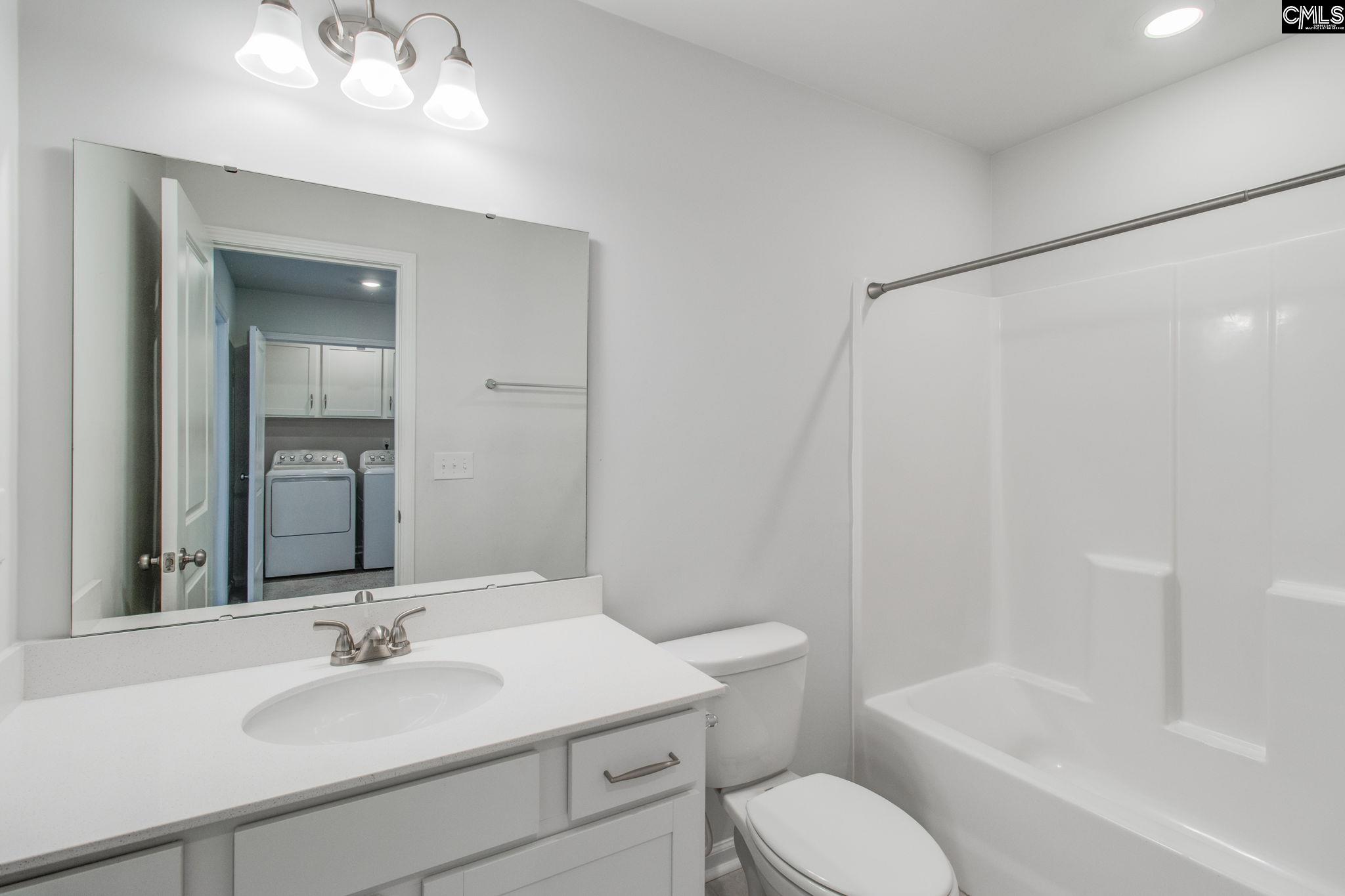 312 Reedmace Court Lexington, SC 29072 - Photo 25 of 29 a bathroom with a sink toilet tub and shower