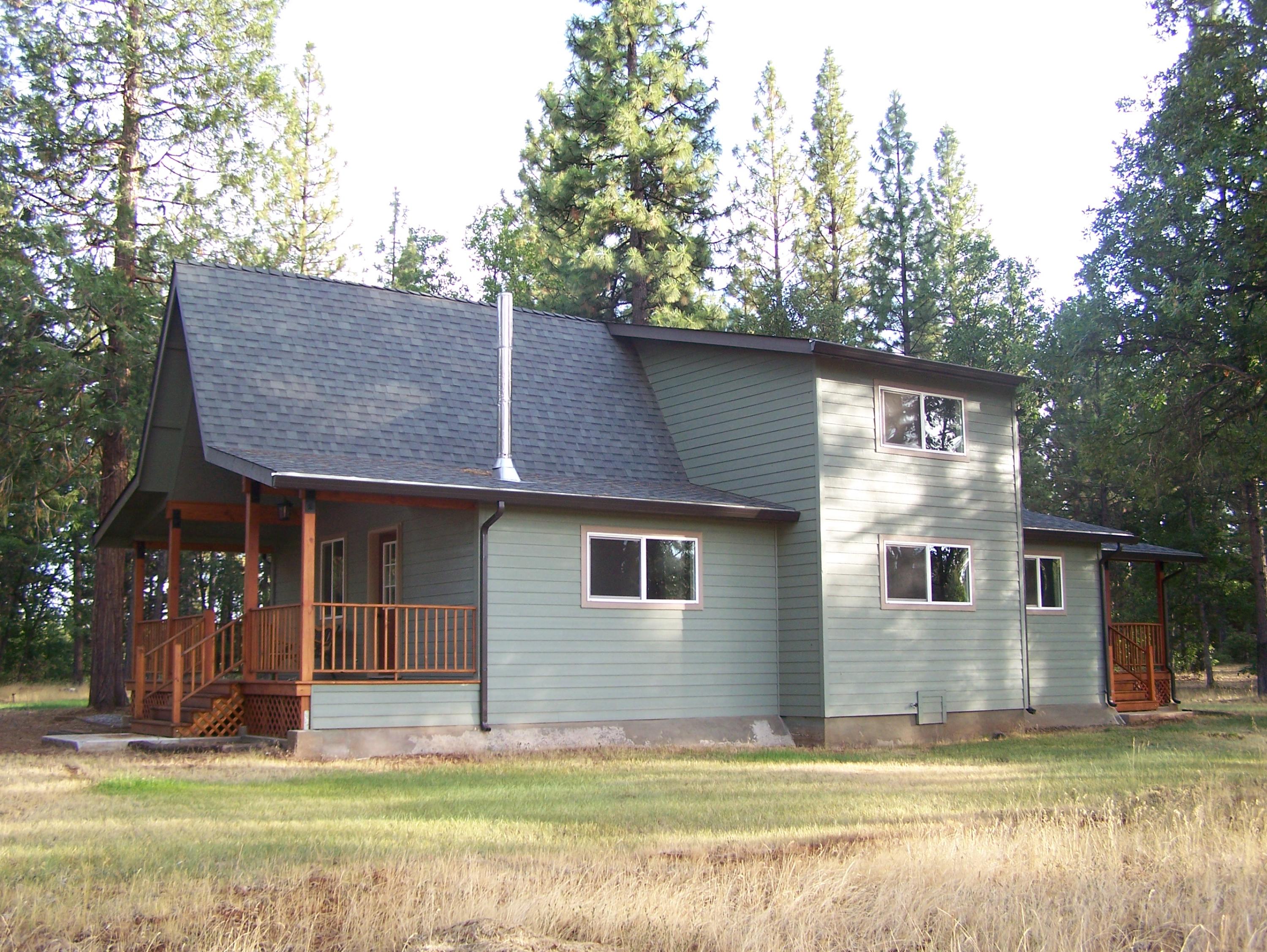 315 Schneider Ranch Road McArthur, CA 96056 - Photo 1 of 16 a view of a house with a yard