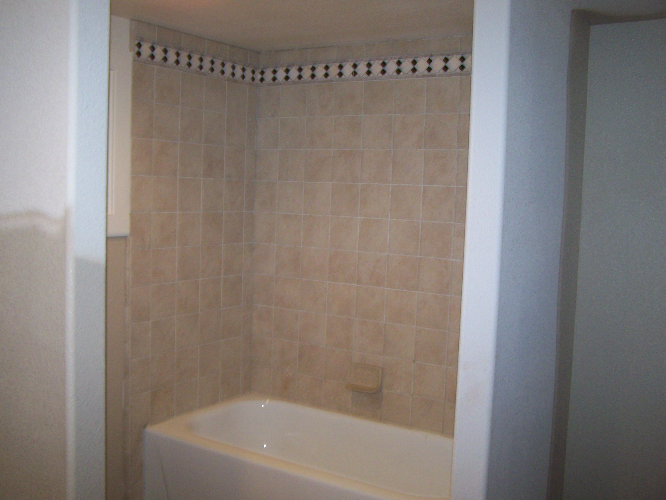 315 Schneider Ranch Road McArthur, CA 96056 - Photo 11 of 16 a close up of a bathtub in a bathroom