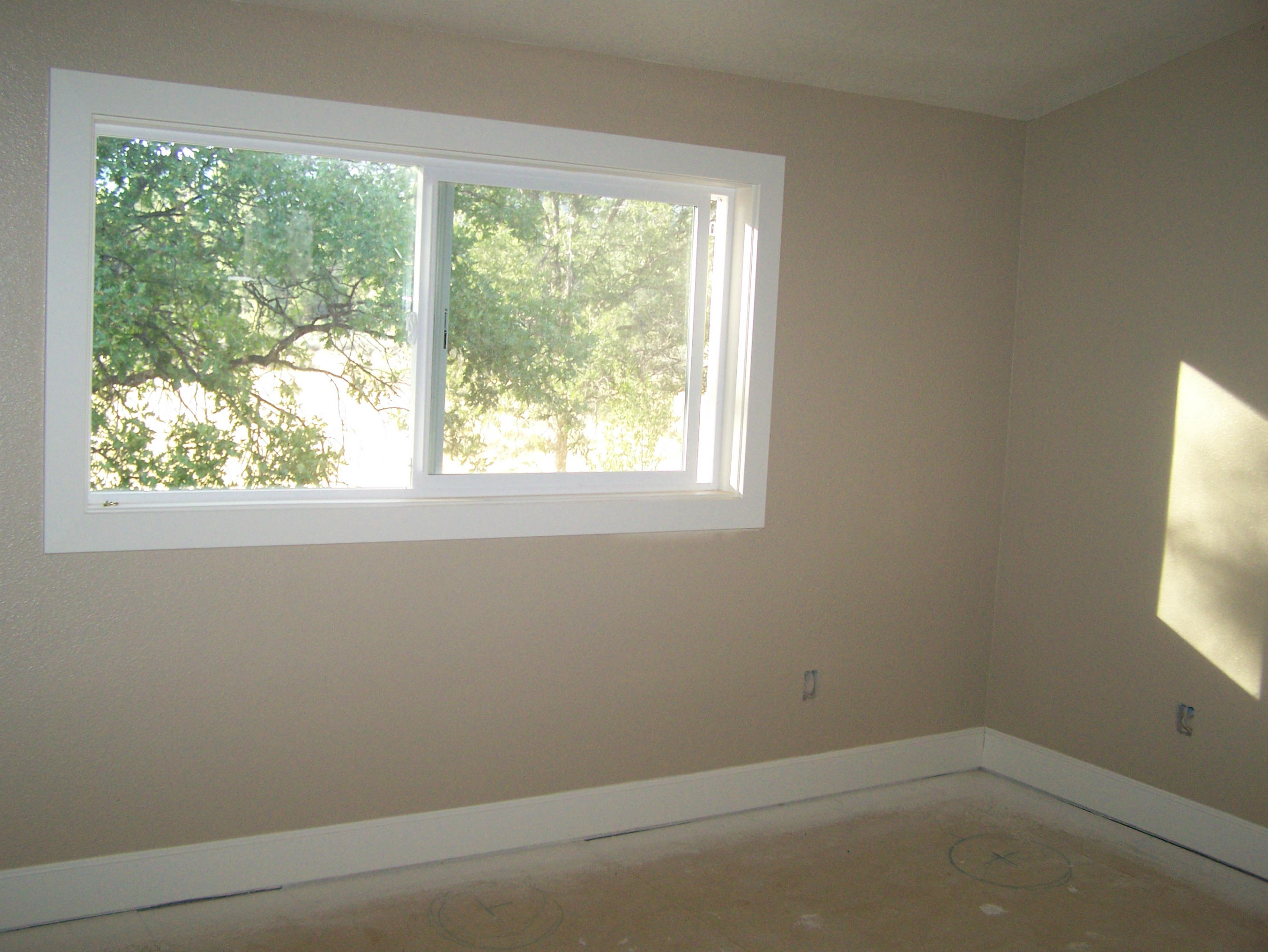 315 Schneider Ranch Road McArthur, CA 96056 - Photo 12 of 16 an empty room with a window