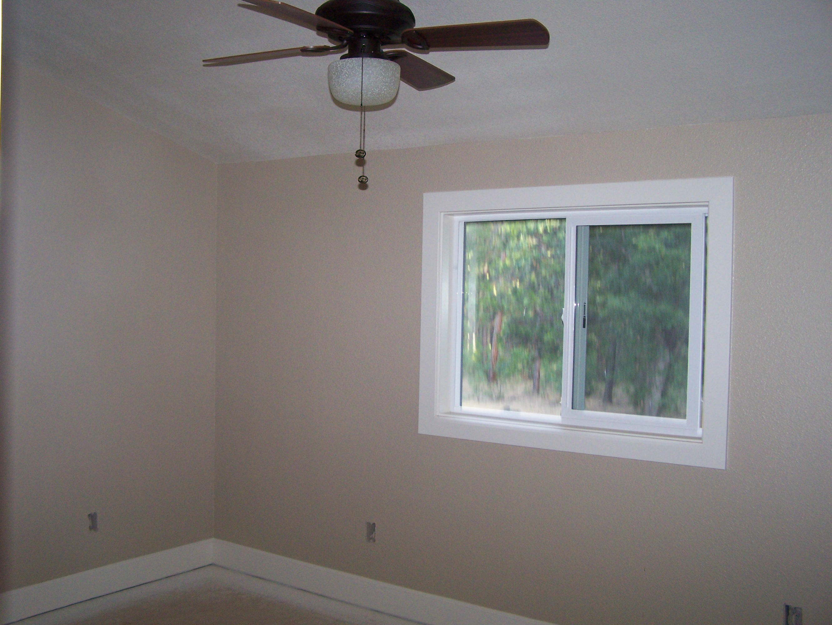 315 Schneider Ranch Road McArthur, CA 96056 - Photo 13 of 16 a small space with a window and a fan