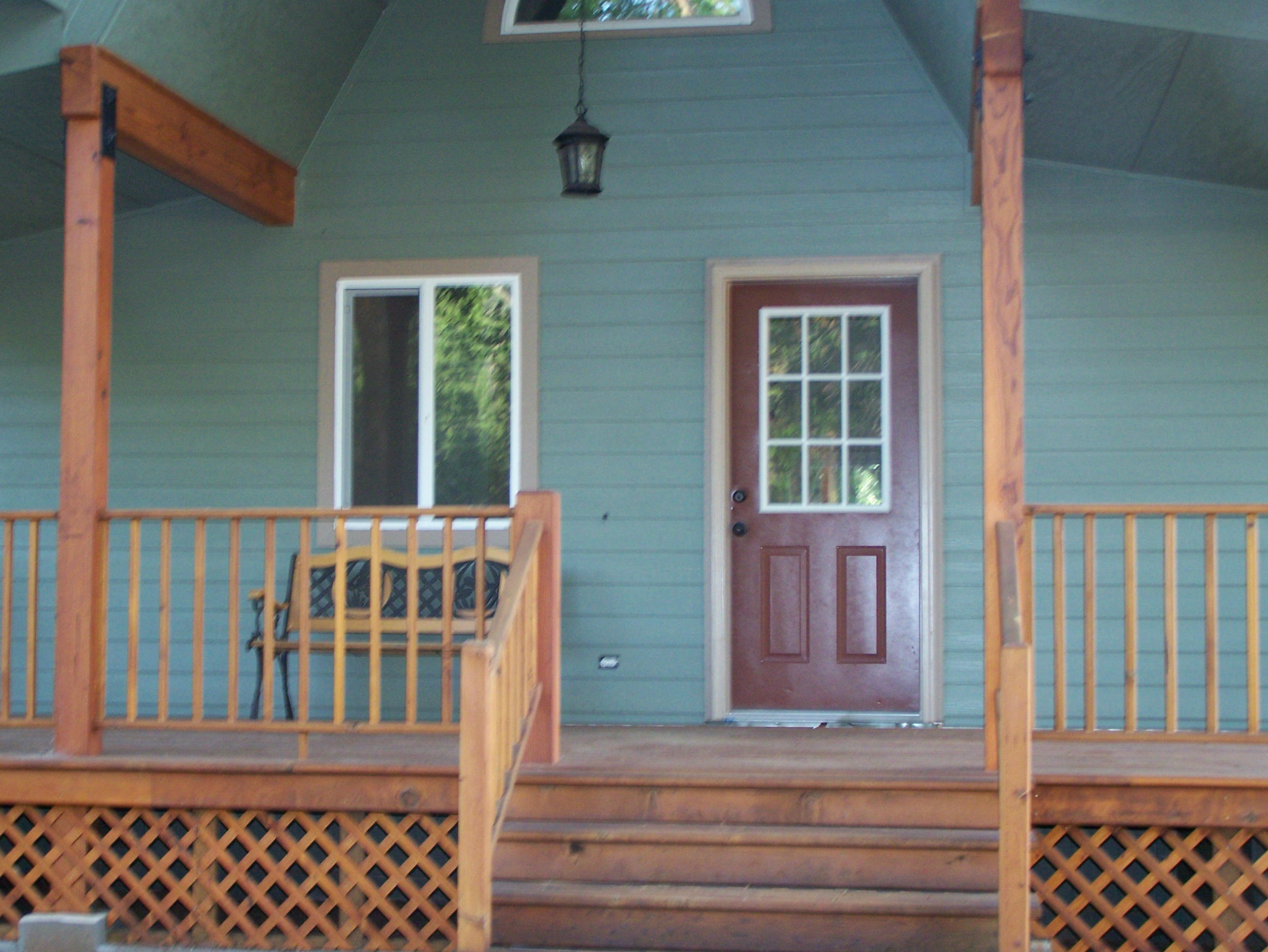 315 Schneider Ranch Road McArthur, CA 96056 - Photo 3 of 16 a view of a brick house with large windows