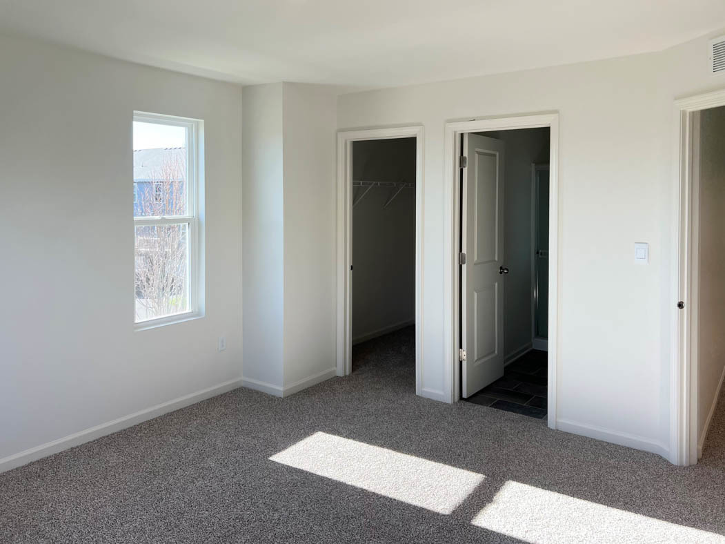 6740 Linden Trail, Unit D Wonder Lake, IL 60097 - Photo 11 of 55 an empty room with windows and closet