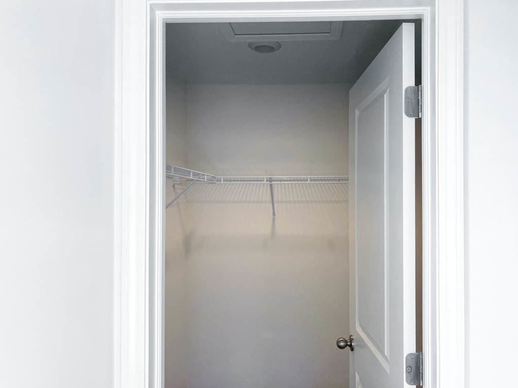 6740 Linden Trail, Unit D Wonder Lake, IL 60097 - Photo 12 of 55 a bathroom with a glass shower door