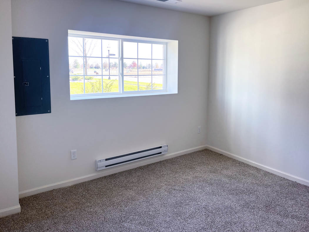 6740 Linden Trail, Unit D Wonder Lake, IL 60097 - Photo 2 of 55 an empty room with a window