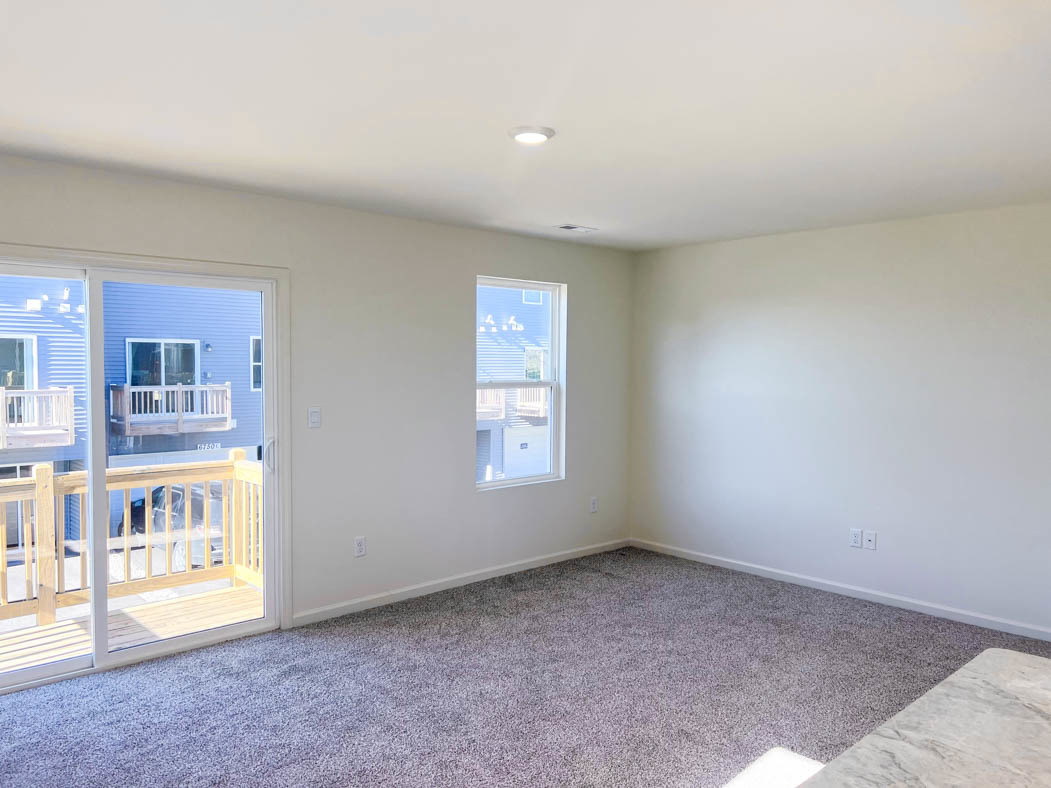 6740 Linden Trail, Unit D Wonder Lake, IL 60097 - Photo 4 of 55 a view of an empty room with a window