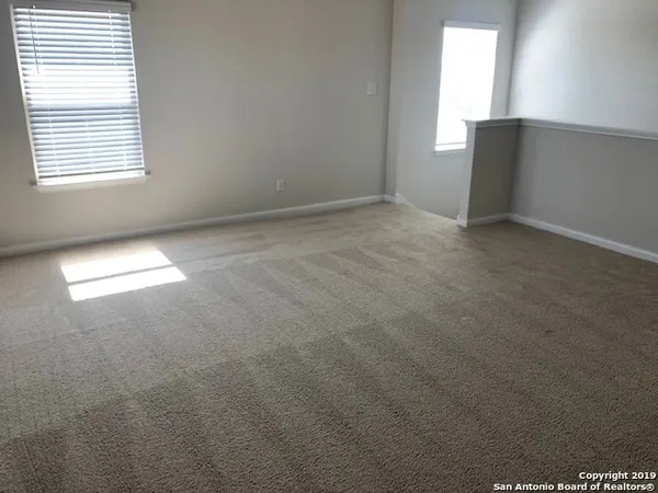 an empty room with a window