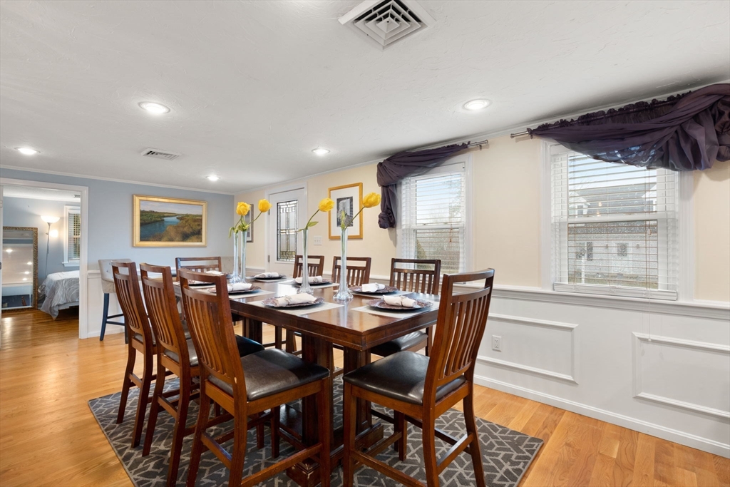 2 Taylor Road Yarmouth, MA 02664 - Photo 11 of 34 a view of a dining room and livingroom with furniture window and wooden floor