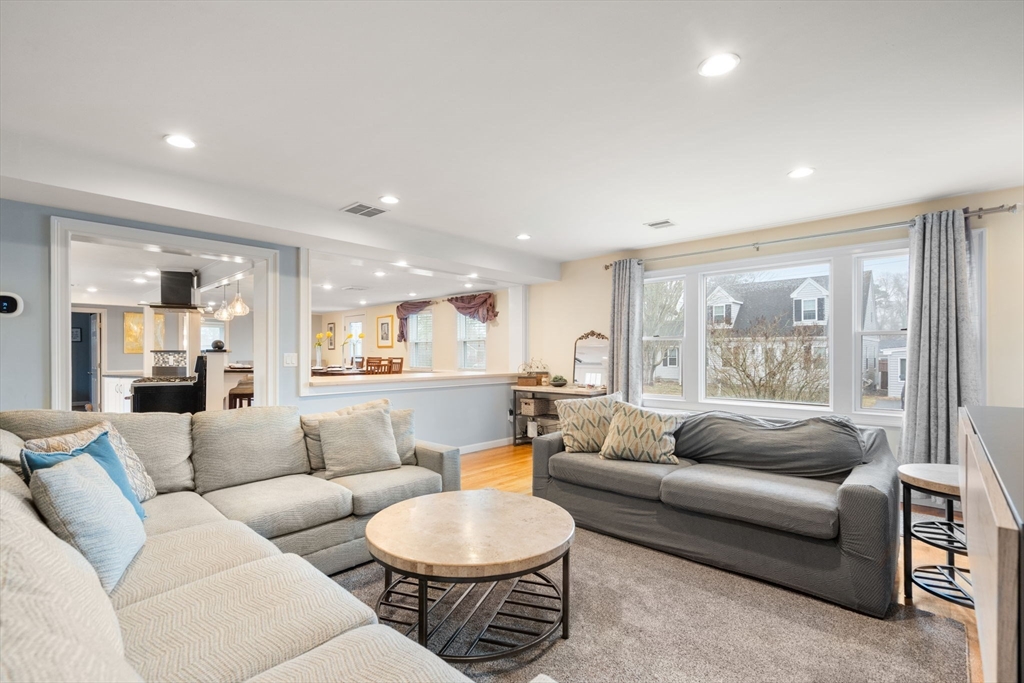2 Taylor Road Yarmouth, MA 02664 - Photo 2 of 34 a living room with furniture and a large window