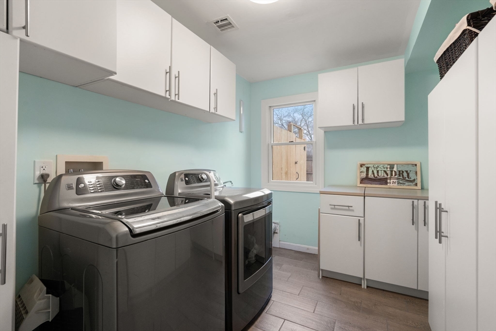 2 Taylor Road Yarmouth, MA 02664 - Photo 22 of 34 a kitchen with sink a stove and cabinets