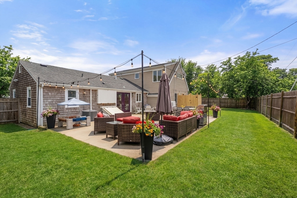 2 Taylor Road Yarmouth, MA 02664 - Photo 29 of 34 a view of a house with backyard and porch
