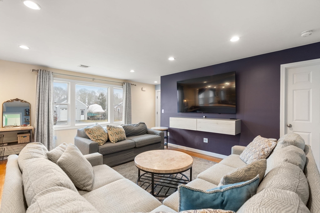 2 Taylor Road Yarmouth, MA 02664 - Photo 3 of 34 a living room with furniture and a flat screen tv