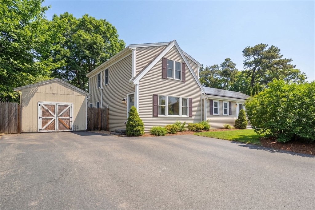 2 Taylor Road Yarmouth, MA 02664 - Photo 33 of 34 front view of a house with a street