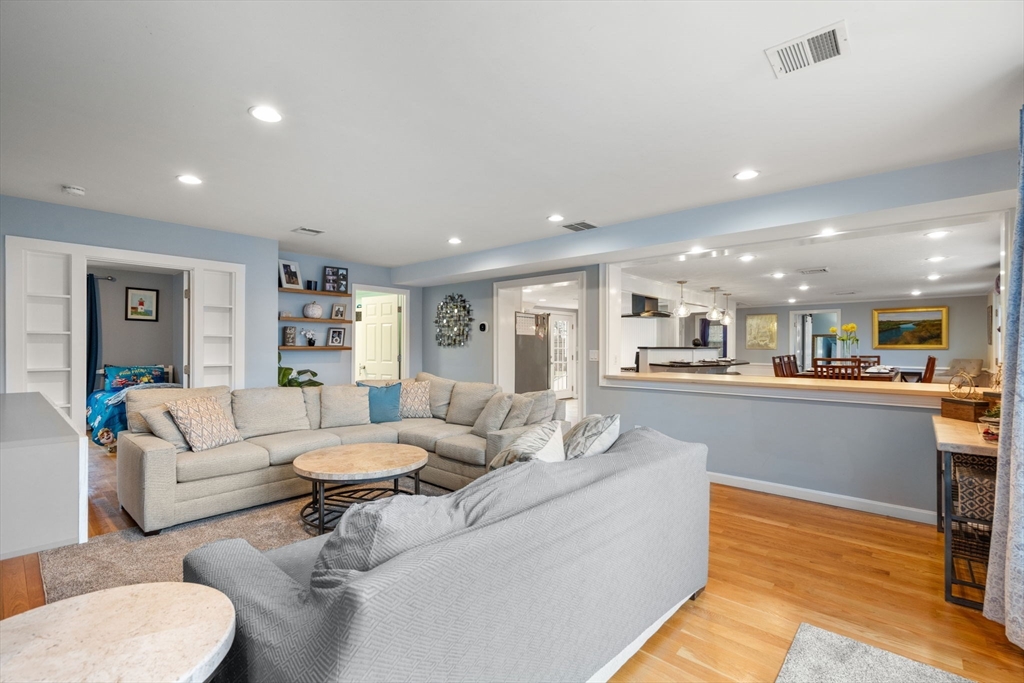 2 Taylor Road Yarmouth, MA 02664 - Photo 4 of 34 a living room with furniture and a wooden floor