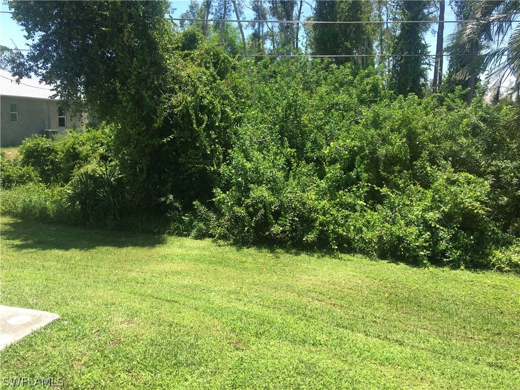 18536 Sebring Road Fort Myers, FL 33967 - Photo 11 of 11 a view of an outdoor space and a yard