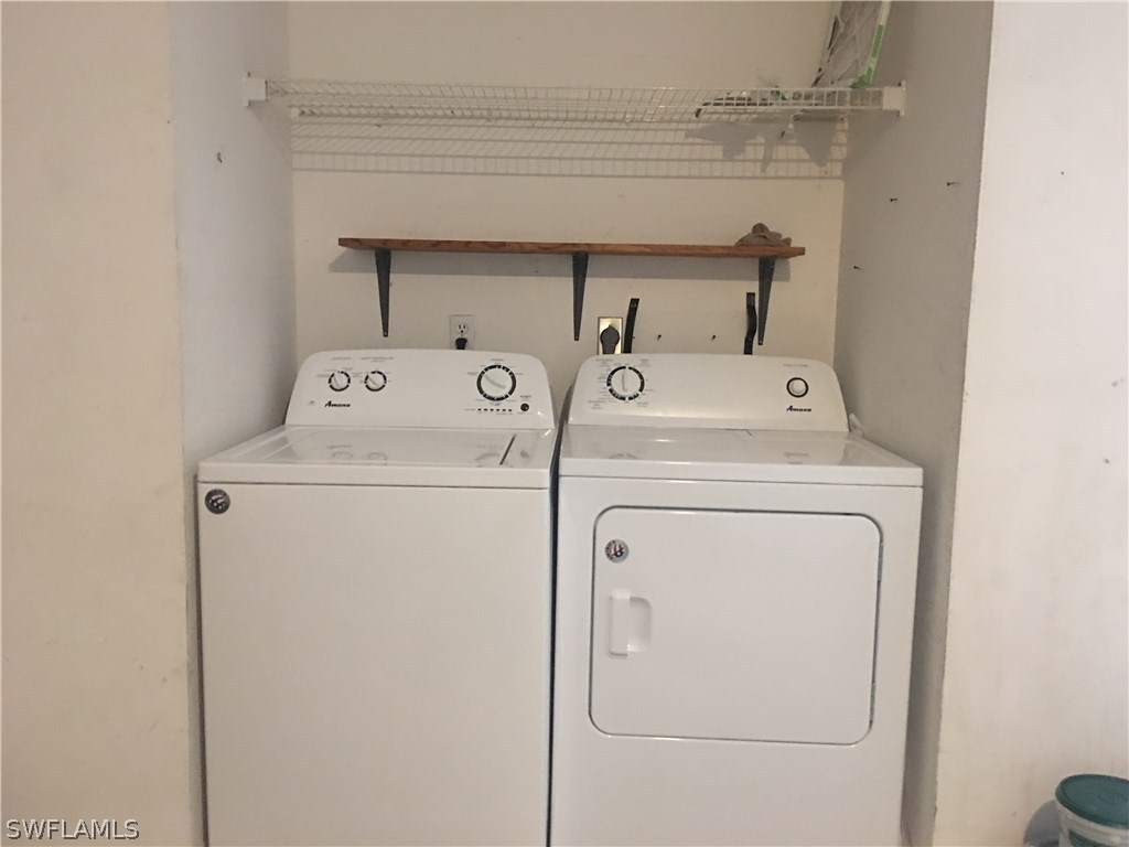 18536 Sebring Road Fort Myers, FL 33967 - Photo 10 of 11 a utility room with dryer and washer