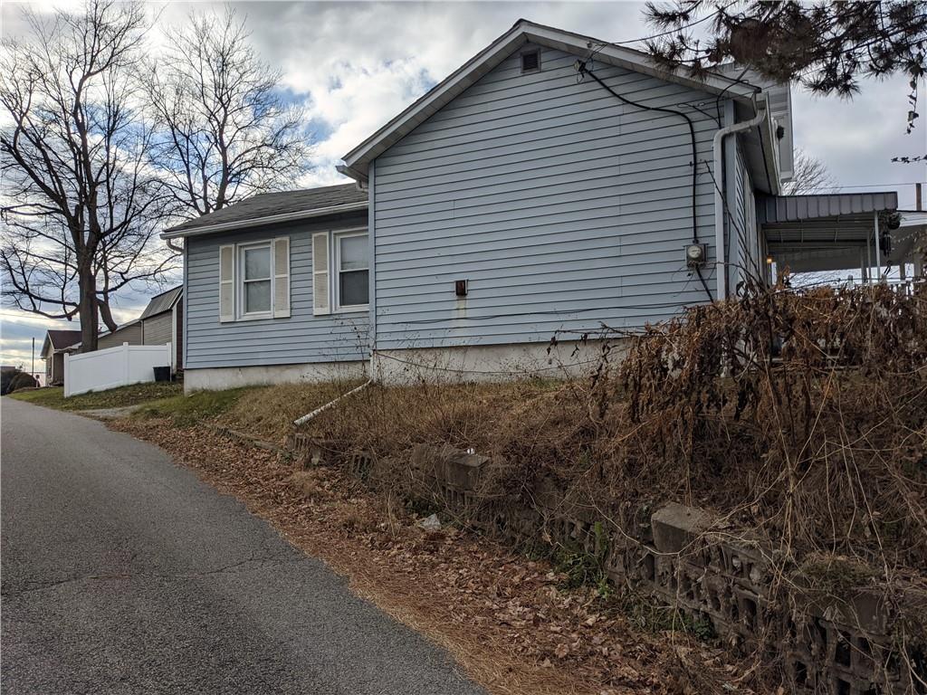 515 East Washington Street Rochester, PA 15074 - Photo 2 of 13 a view of a house with a yard