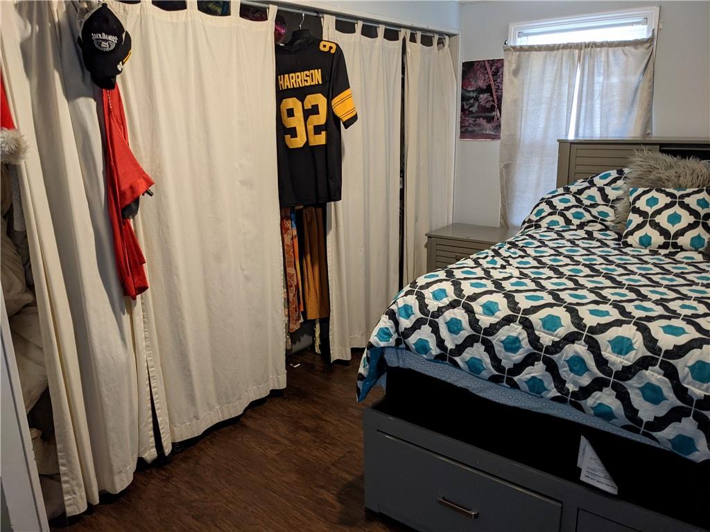 515 East Washington Street Rochester, PA 15074 - Photo 12 of 13 a bedroom with bunk bed and a window