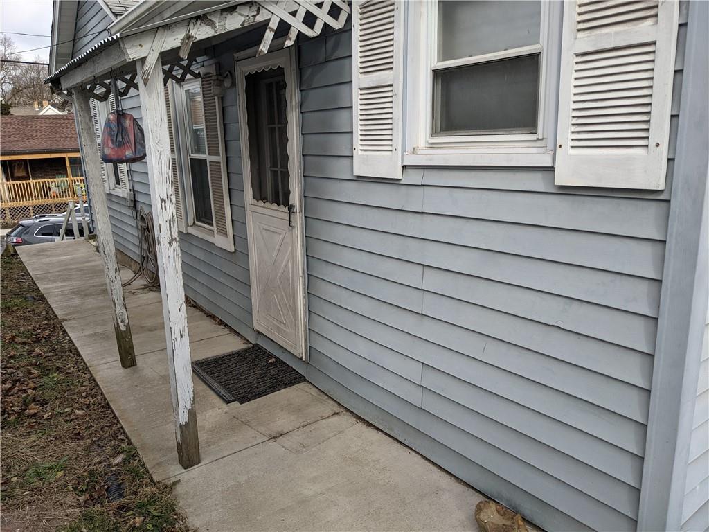 515 East Washington Street Rochester, PA 15074 - Photo 13 of 13 a view of a house with a door and a window