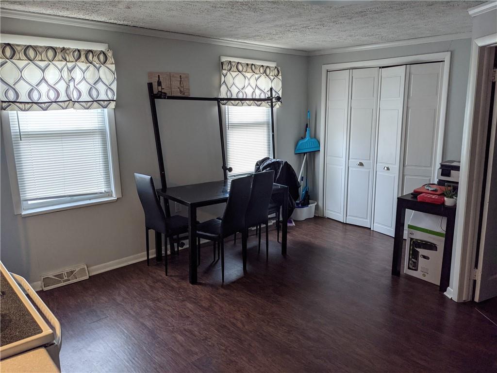 515 East Washington Street Rochester, PA 15074 - Photo 7 of 13 a view of a livingroom with furniture window and wooden floor