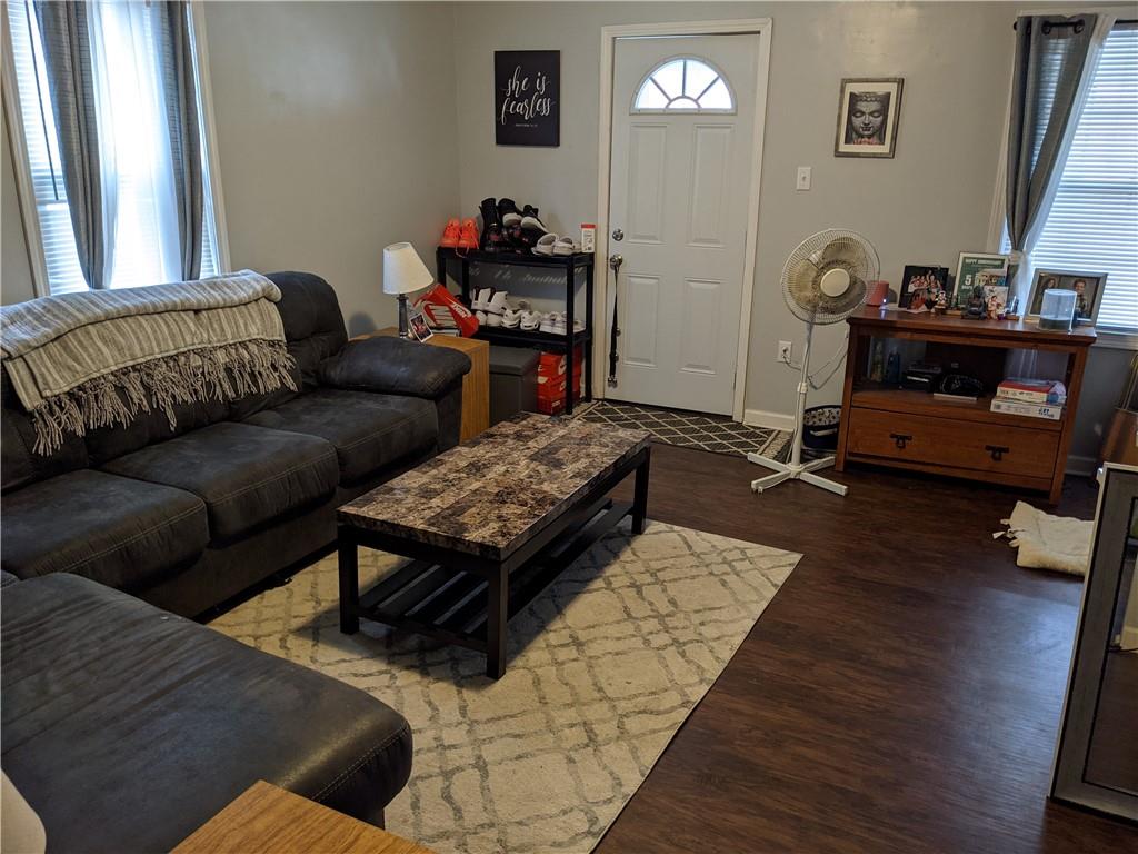 515 East Washington Street Rochester, PA 15074 - Photo 8 of 13 a living room with furniture and a wooden floor