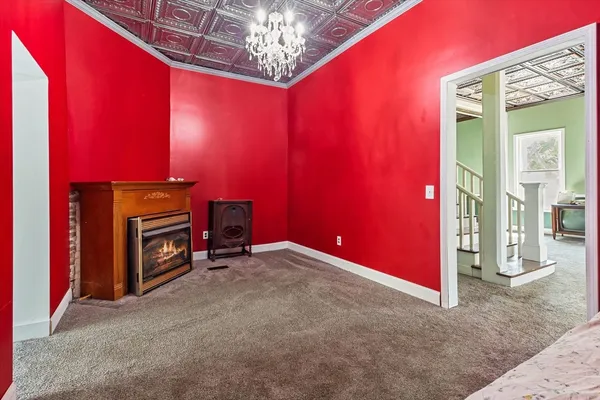 a bathroom with a granite countertop sink a mirror and a bathtub