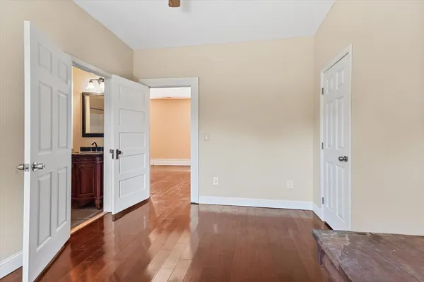 a view of a backyard with swimming pool