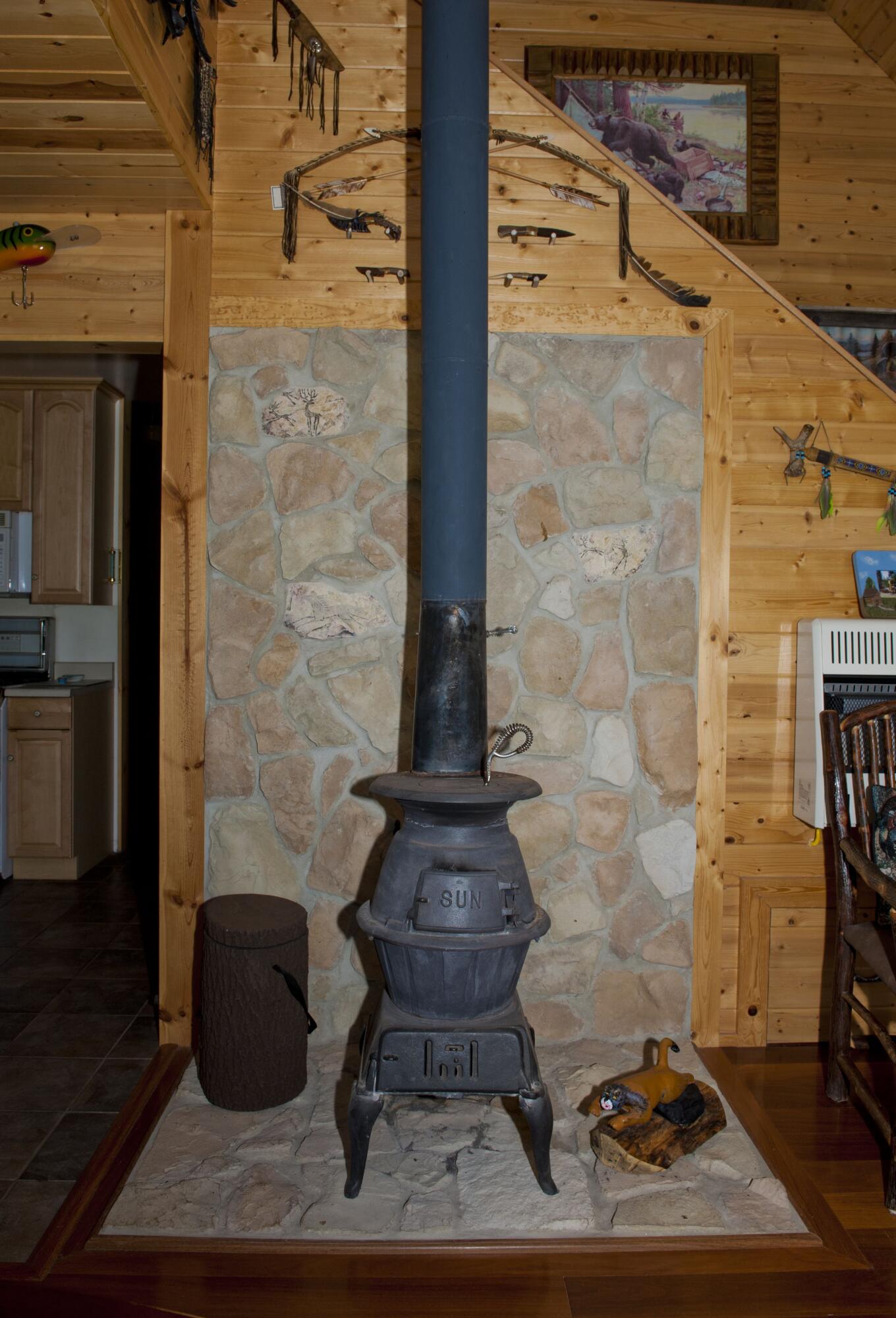 38 North Box Cyn Road Springdale, UT 84767 - Photo 11 of 20 11 Pot Belly Stove in Family Room