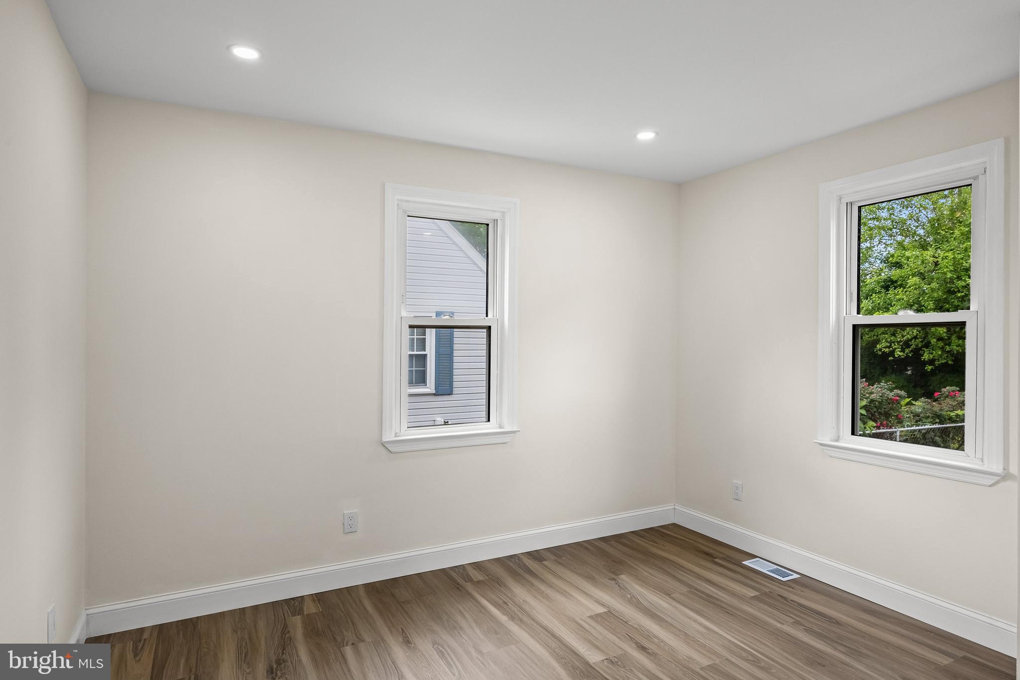 937 Clements Bridge Road Barrington, NJ 08007 - Photo 26 of 34 an empty room with a window