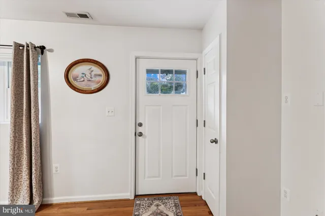 a picture of a book and a white bed