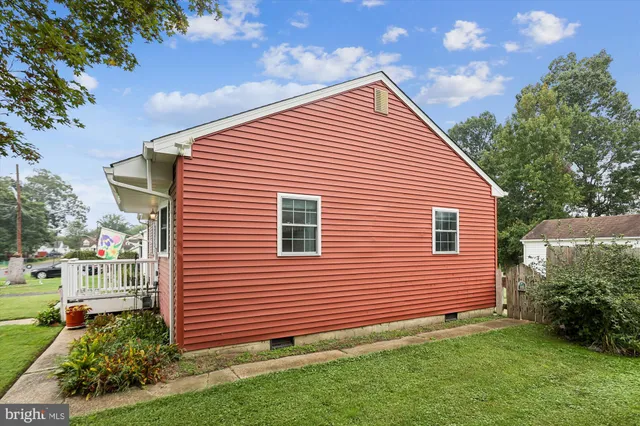 a front view of house with garden